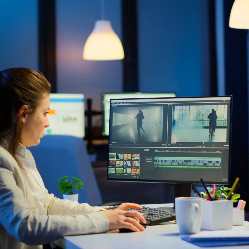 videographer-overworking-at-computer-from-business-office.jpg